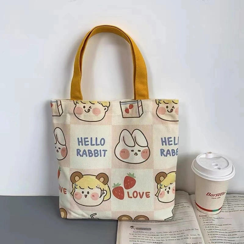 Wholesale/Supplier Kids' High quality/High cost performance  Fashionable Cartoon Print Colour Canvas Tote Bag Shopping Bag for Student Lunch Cylinder Bento Bag