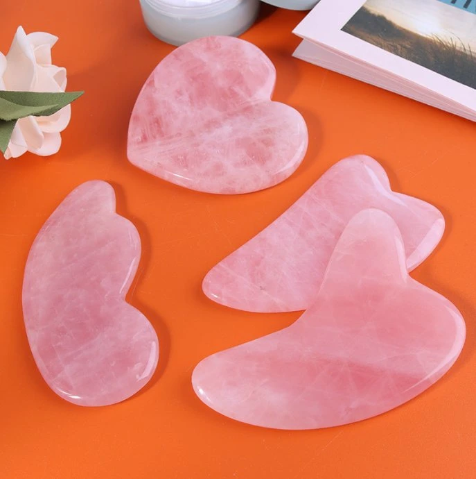 Venta caliente SPA Cuarzo rosa en forma de corazón Gua Sha Masaje herramienta