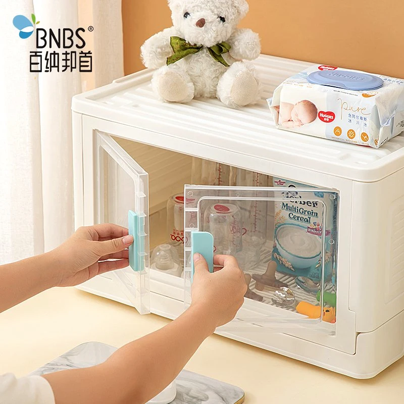 Armoire de rangement pour produits maternels et infantiles avec un design pliable en plastique.