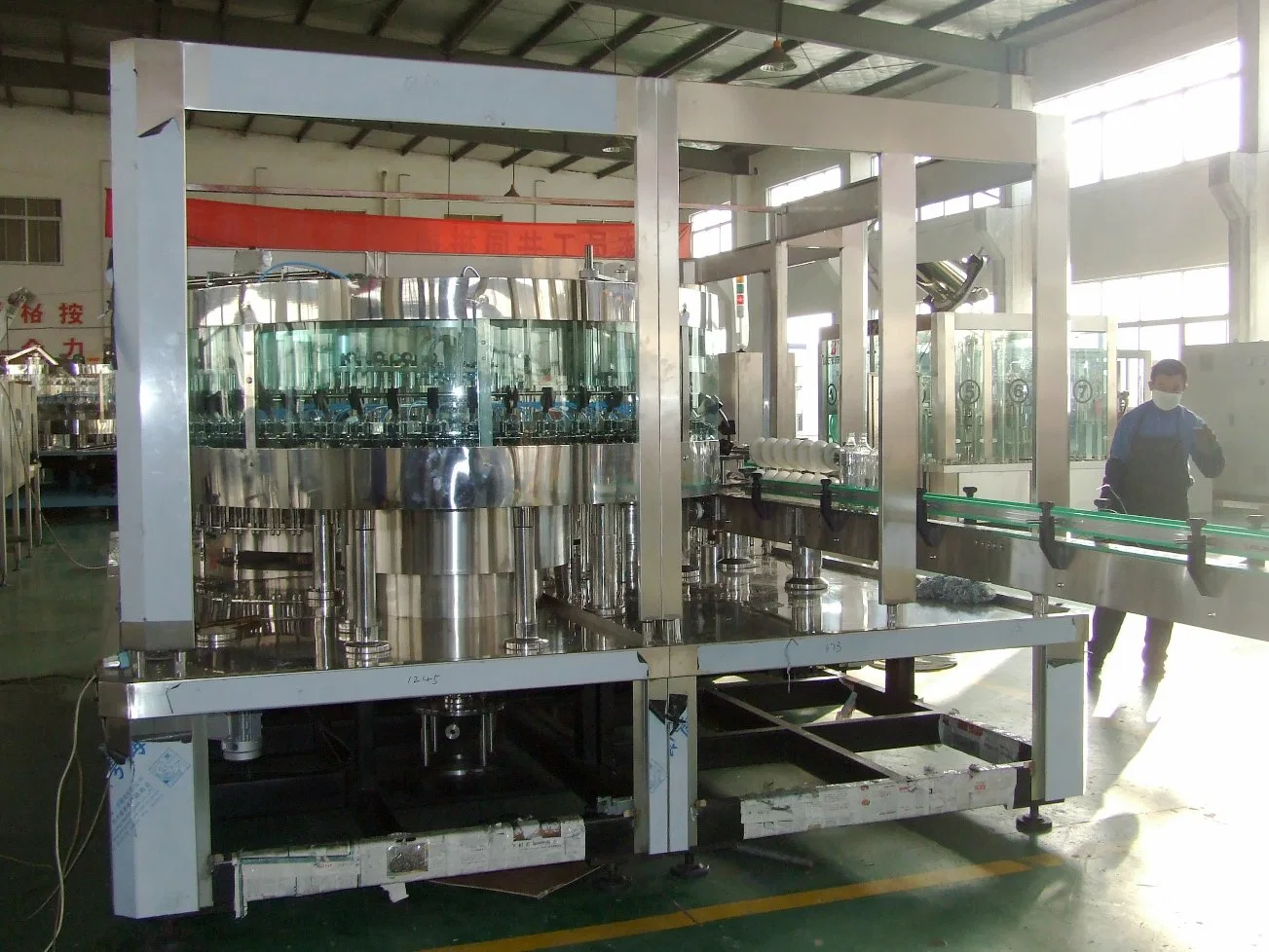 Liquid Hot Filling, Washing, Sealing Three-in-One Machine (RXGF)