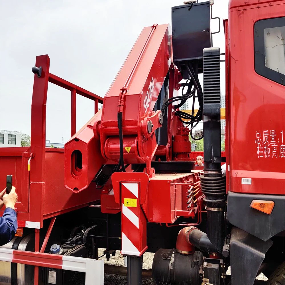 Brazo elevador hidráulico con grúa plegable, giratoria y telescópica montada en vehículo