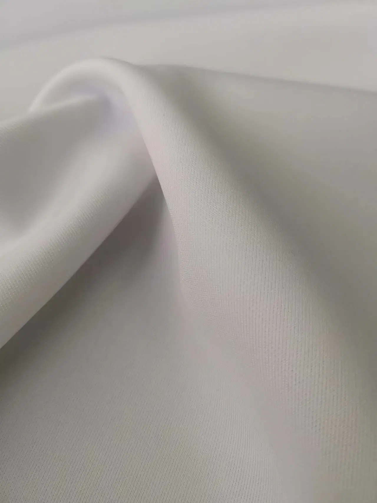 Chinois bonne qualité fournisseur Prix bon marché Double-Sided Layer Interlock Scuba Vêtements de sport en tissu tricoté et tissu uniforme