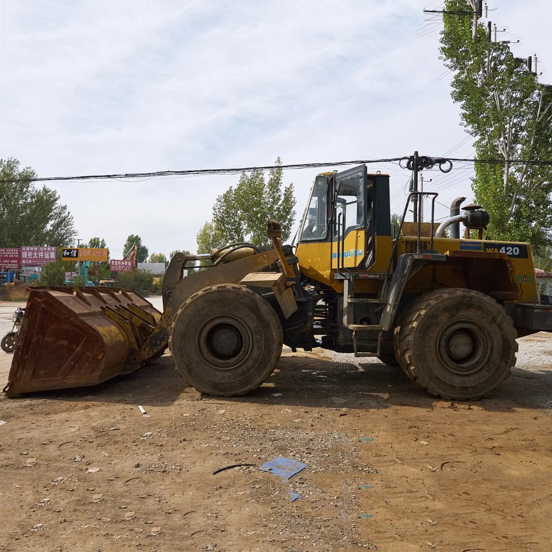 Tractor Mini con ruedas de cucharón de traílla de segunda mano con cargadora y. Excavadora