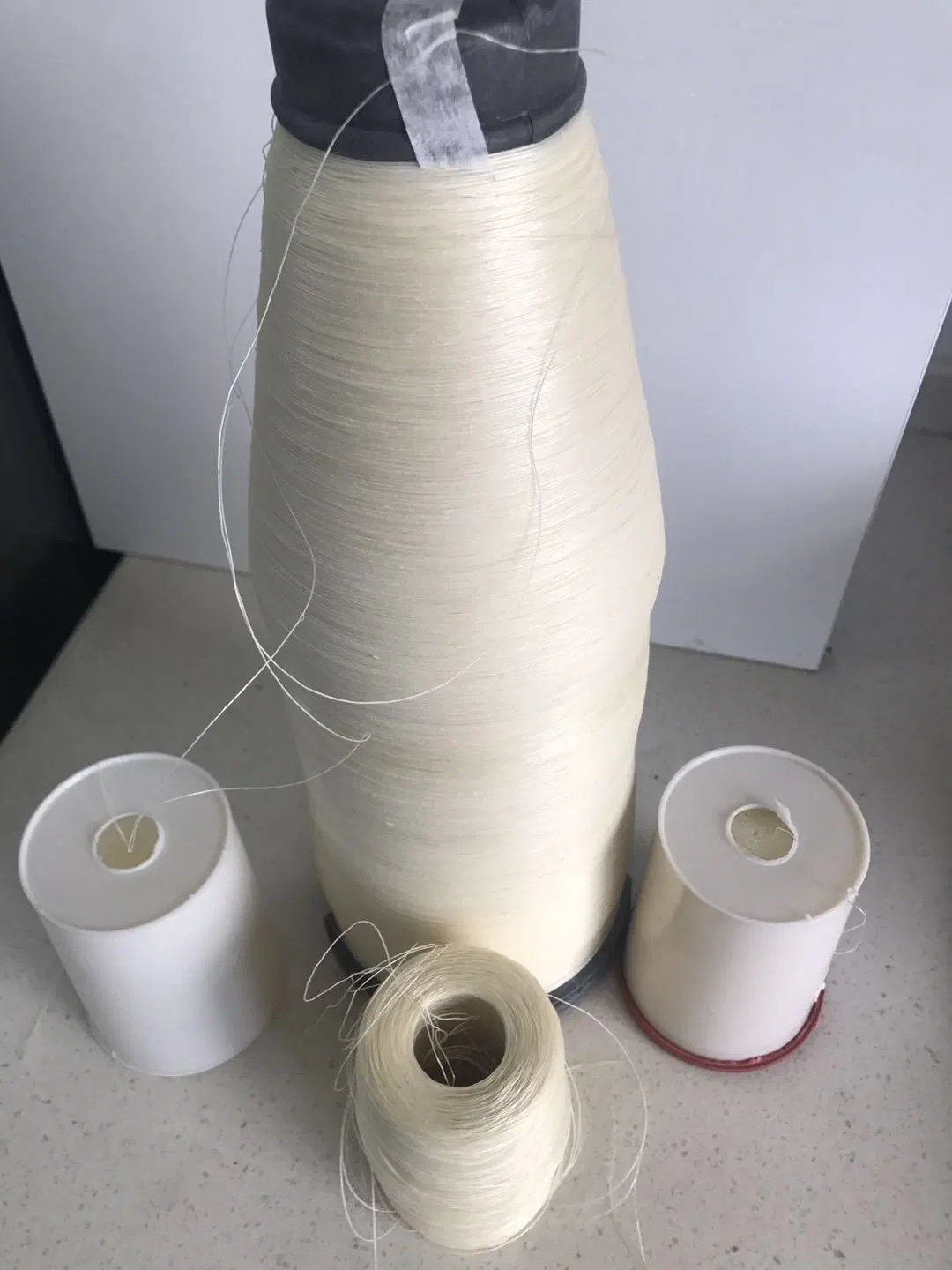 Holt Sales Polyester Hot Melt Yarn Thread Wholesale/Supplier SGS Certificate 110 Hot Melt Yarn for Shoes Upper Low Melt Fiber Polyester for Flyknit Uppers Knitting