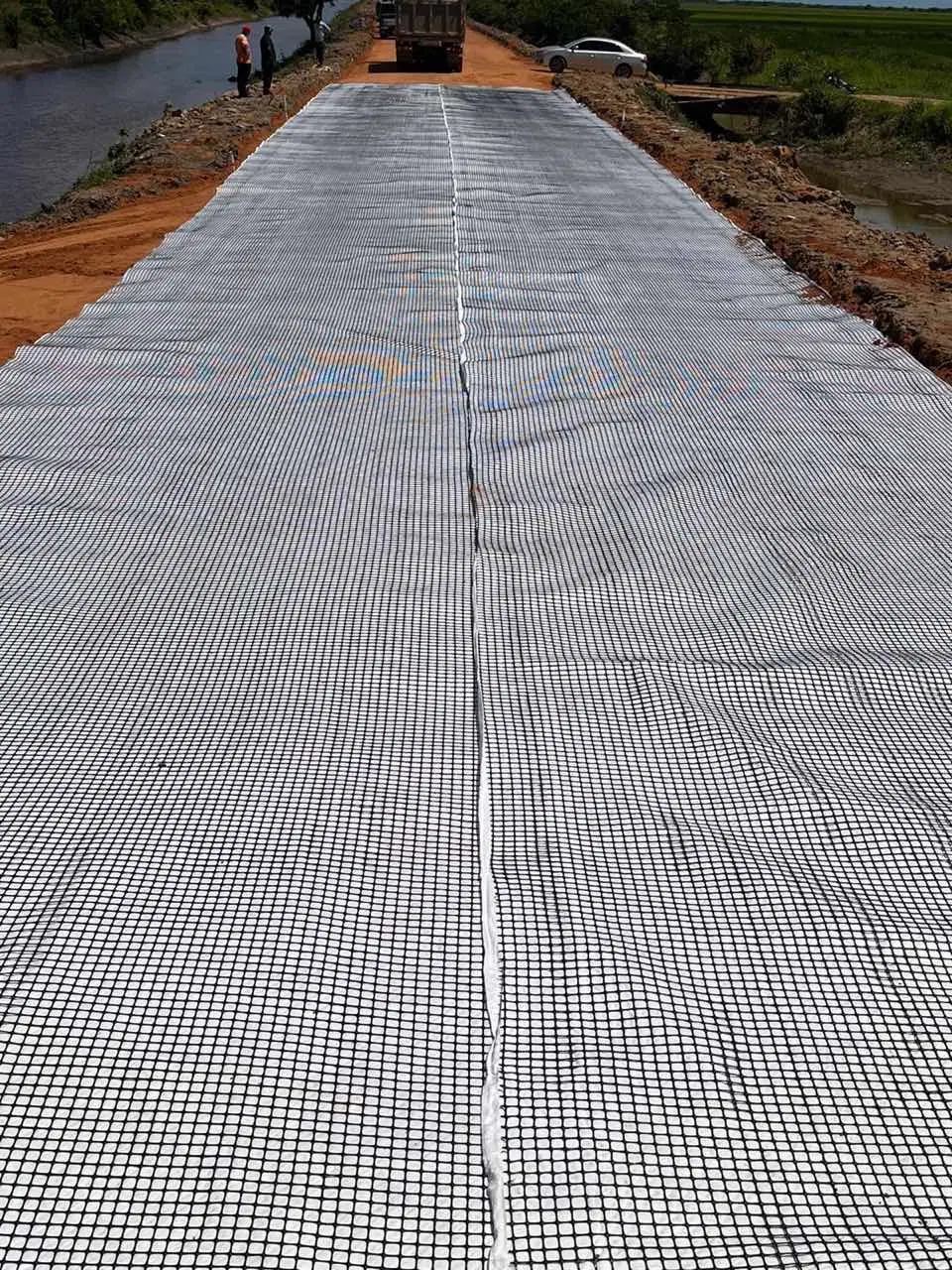 Geocomposite Composite Geogrid PP Biaxial Geogrid Bx3030 Bonded to Pet Nonwoven Geotextile for Driveway