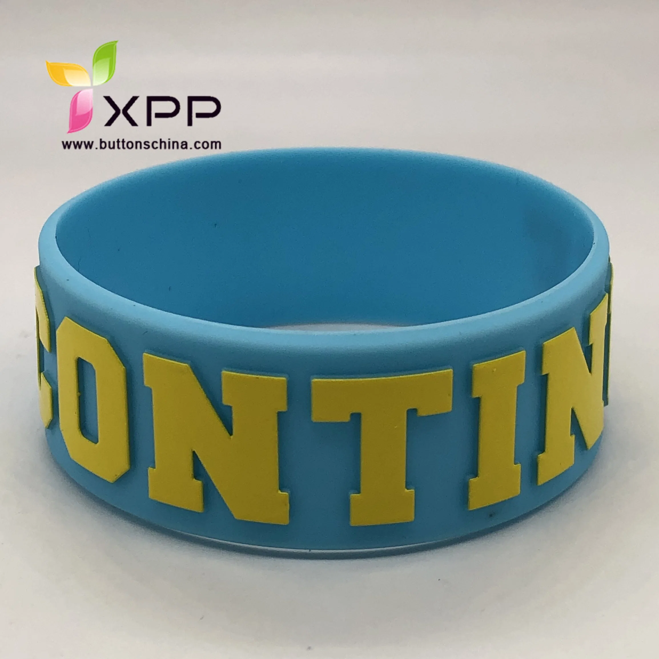 China Manufacturer, Fashion Silicone Wristband Embrossed Filled for Promotion Gift