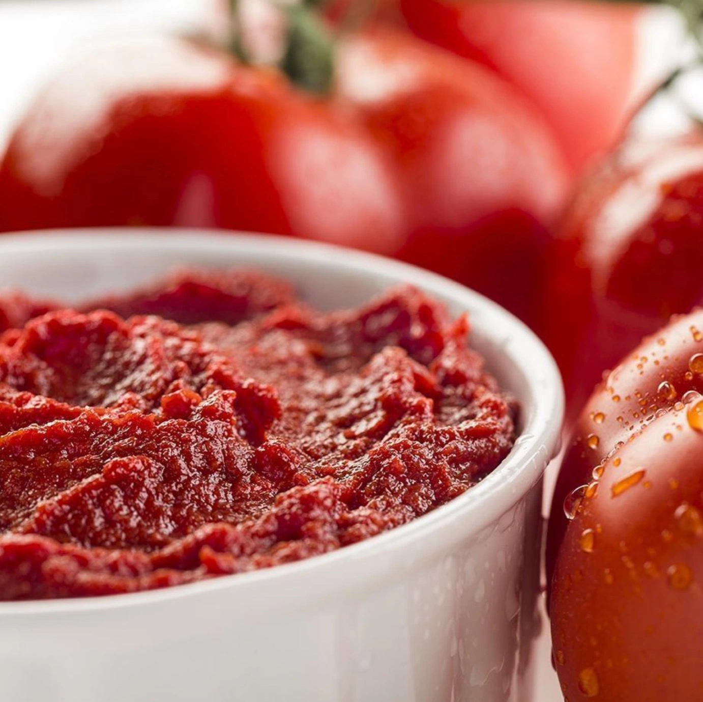 Sauce tomate biologique en vrac Ketchup de tomate Marque OEM personnalisée de Xinjiang Pas cher Pâte de tomate Cold Break 36-38%CB Naturelle en fût Pâte de tomate