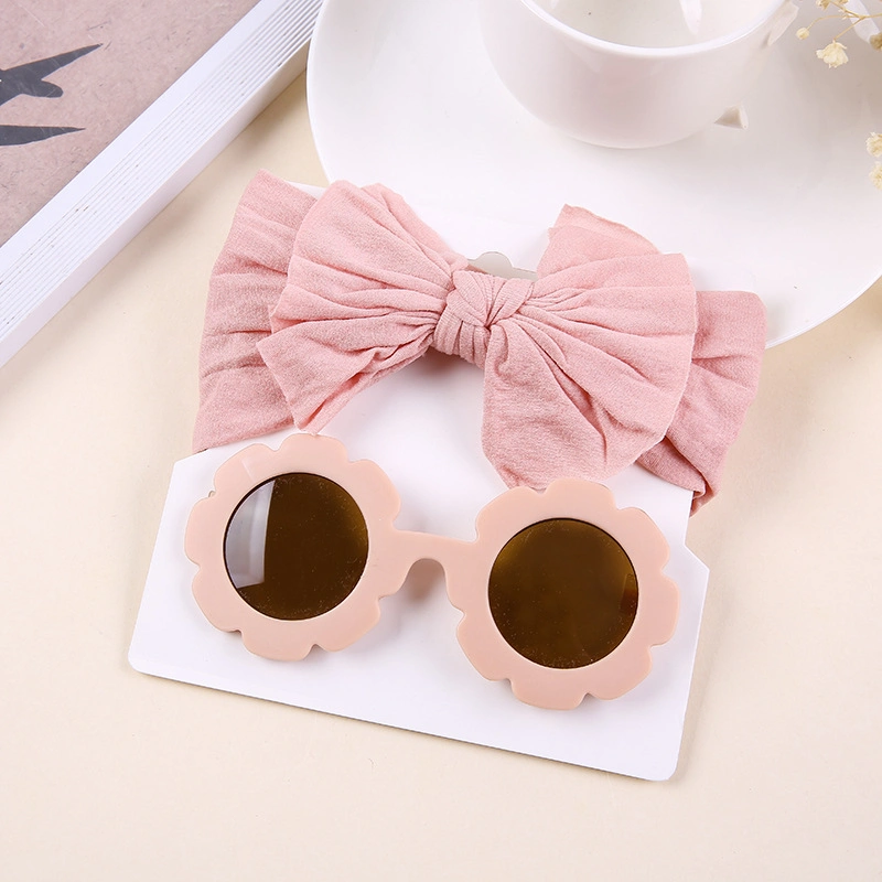 O bebé Toddler Headdress Girl Bow Sweat-Absorbing ajustável e o conjunto de óculos