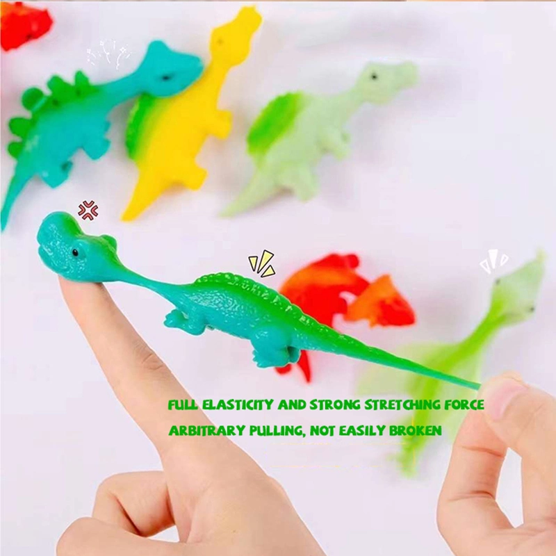 Alivio del estrés de TPR pegajoso volar dinosaurio catapulta Fidget Dedo de goma elástica Flick Dino Animal niños novedad juguetes Slingshot