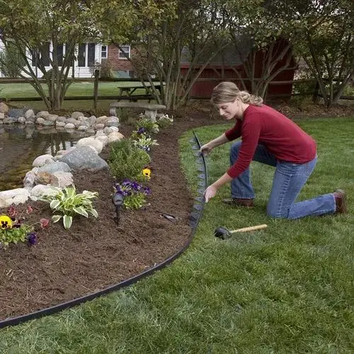 L'herbe de chants de la courroie de clôture de la frontière de l'isolement de la pelouse du jardin Pierre barrière de chemin de la courroie d'écologisation de patio jardin en plastique de l'Extrusion de clôture rendant la production de la machine