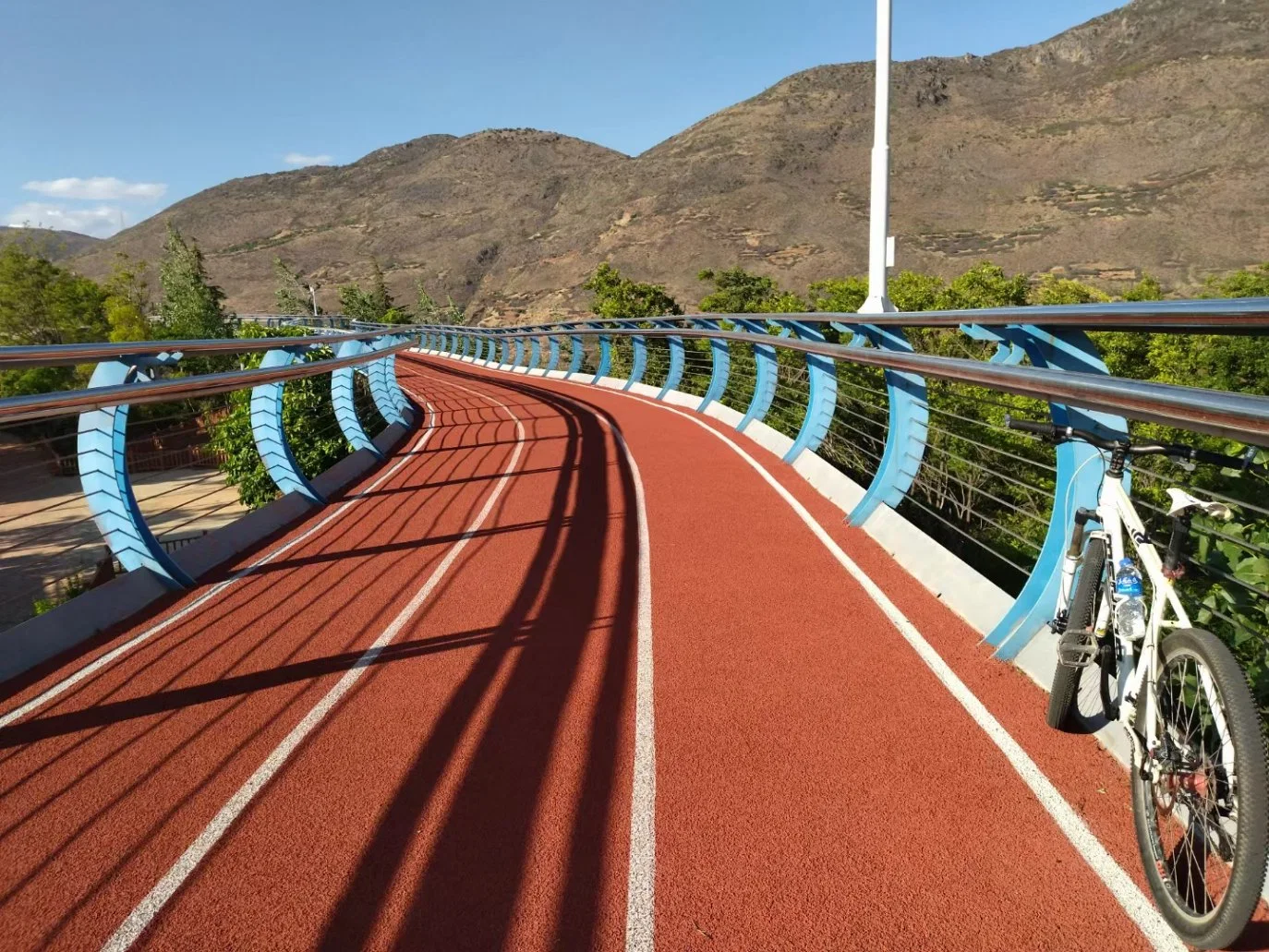 All-Weather Surface That Is Resistant to UV Degradation Abrasion Shrinkage Mold and Most Common Oils and Chemicals Running Track