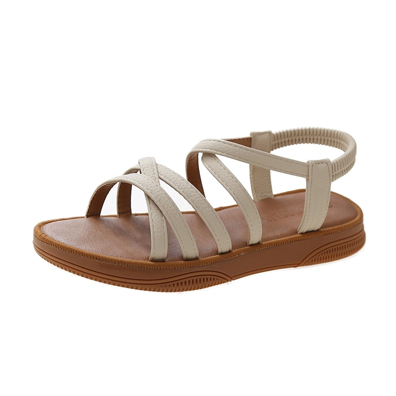 2023 Summer New Korean Version of Flat Sandals Female Elastic Strap Set Foot Cross Soft Sole Student Casual Sandals Wholesale/Supplier