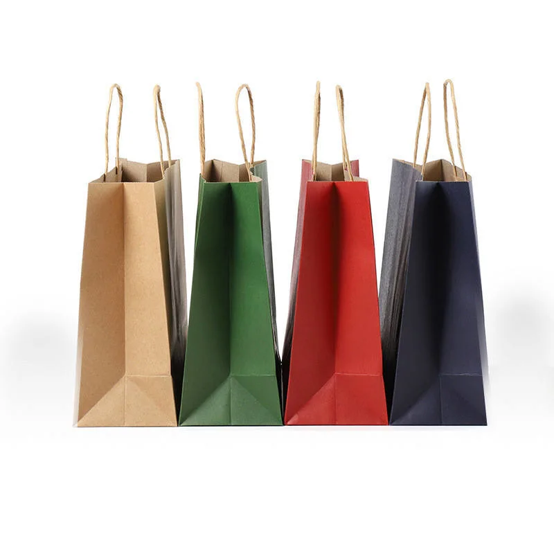 Cadeau de gros de vêtements personnalisés de l'emballage à emporter un sac de shopping sac de papier Kraft avec votre propre Logo