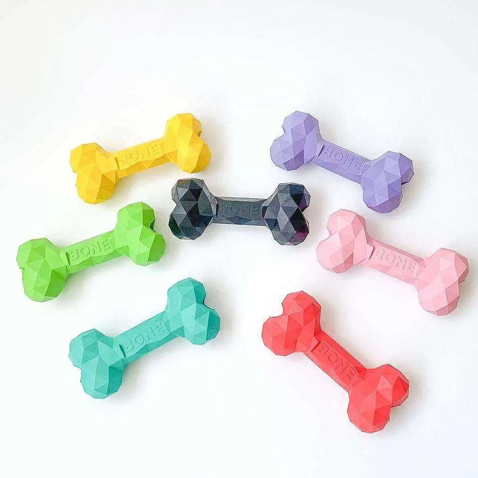 Fabricante Pet Dog Toys Bone Chew Toys Coradores agresivos de goma Juguete de entrenamiento de perros