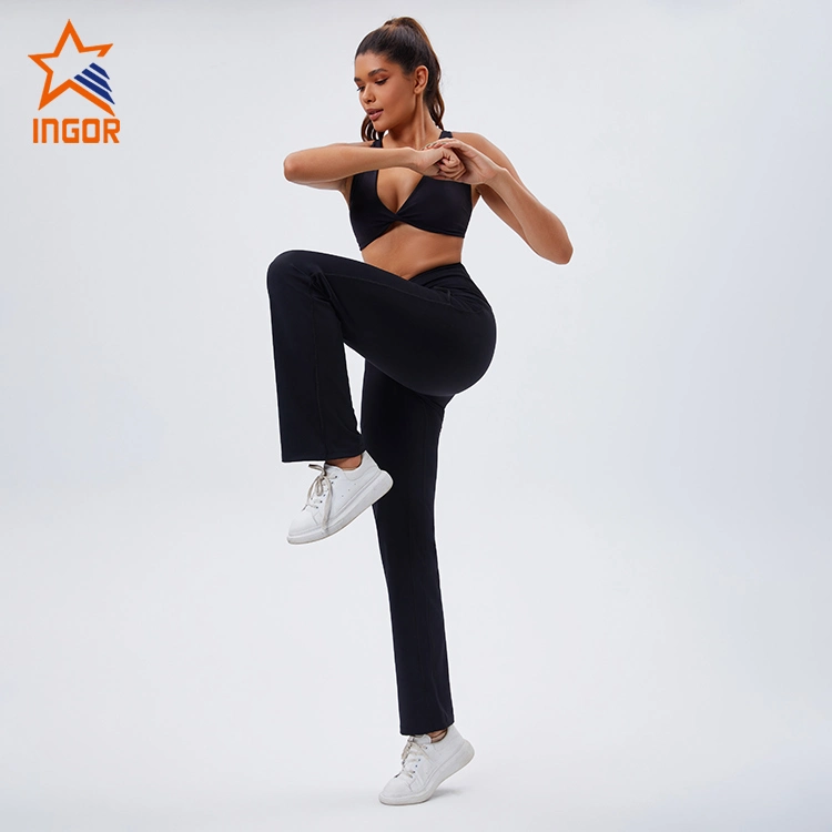 Ingor Sportswear Mayoreo ropa de ejercicio mujeres Mayoreo ropa de seguimiento personalizada mujeres Fitness Sports Sujetador + Flare Leggings pantalones conjunto de 2 piezas Ropa de entrenamiento de yoga