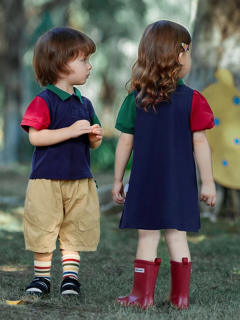 Mayorista/Proveedor Moda de alta calidad Logo personalizado Colorblock Azul marino Unisex Polo uniforme para niños de punto