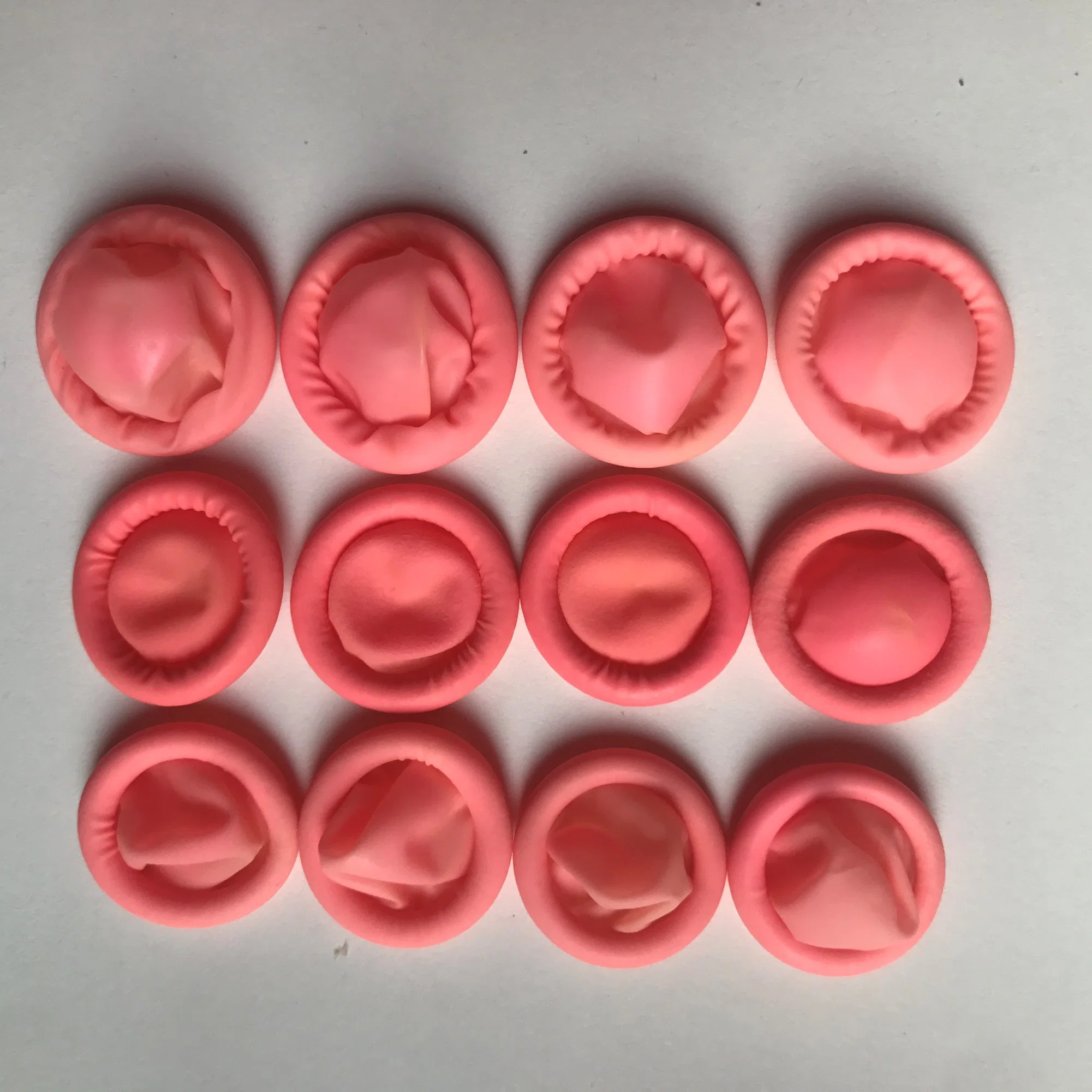 Protectores de dedos desechables de látex rosa antiestáticos S/M/L/XL textura superficial antideslizante