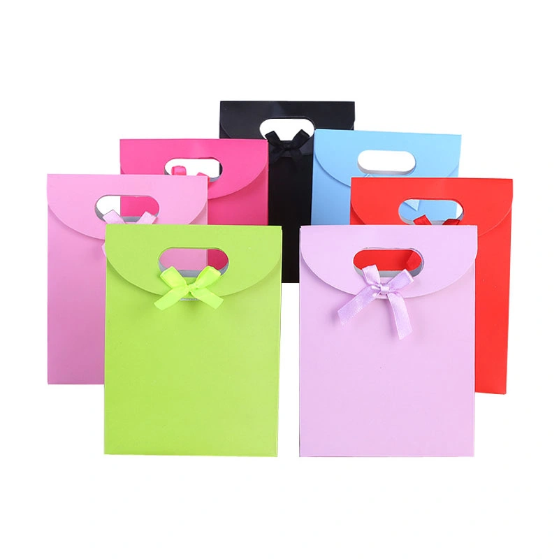 Reciclar precios baratos de regalo de la marca impresa personalizada bolsa de papel de compras de navidad con su propio logotipo