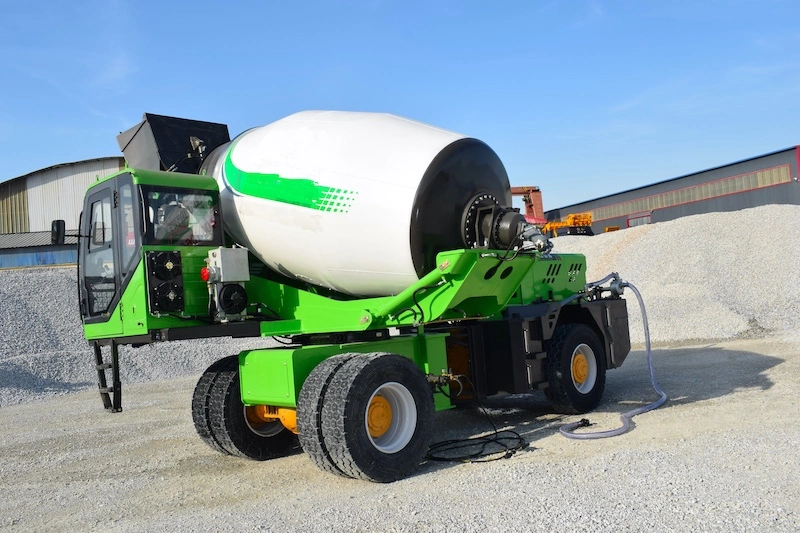 Forload la construcción de carreteras de la propia máquina de alimentación de la carga de camiones hormigonera