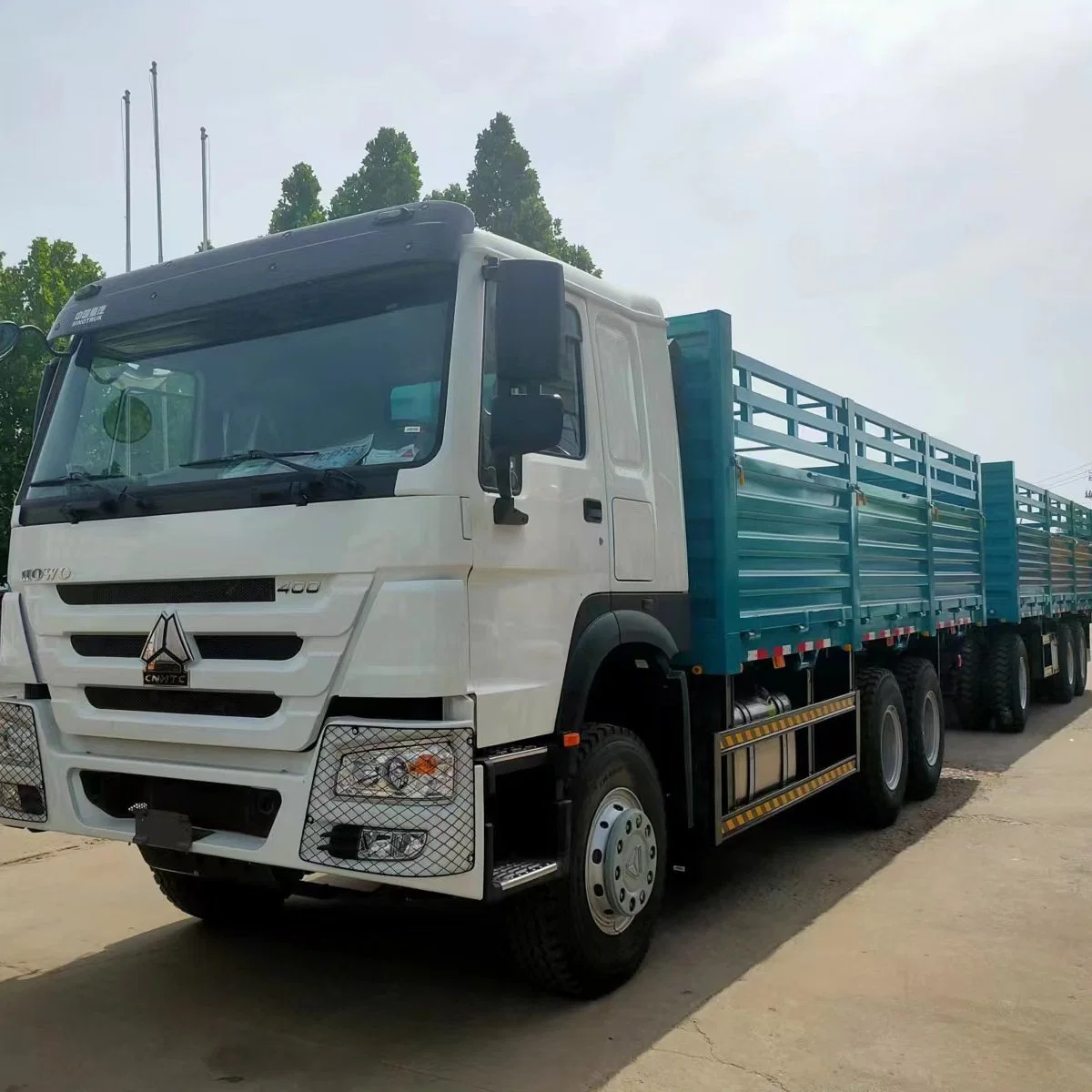 Sinotruk Sinotruck barato Nuevo usado HOWO Hohan 6*4 Sidewall Drop Flatbed Van Lorry 10 Wheeler Board Fence Box camión de carga Con remolque completo para la venta de Etiopía