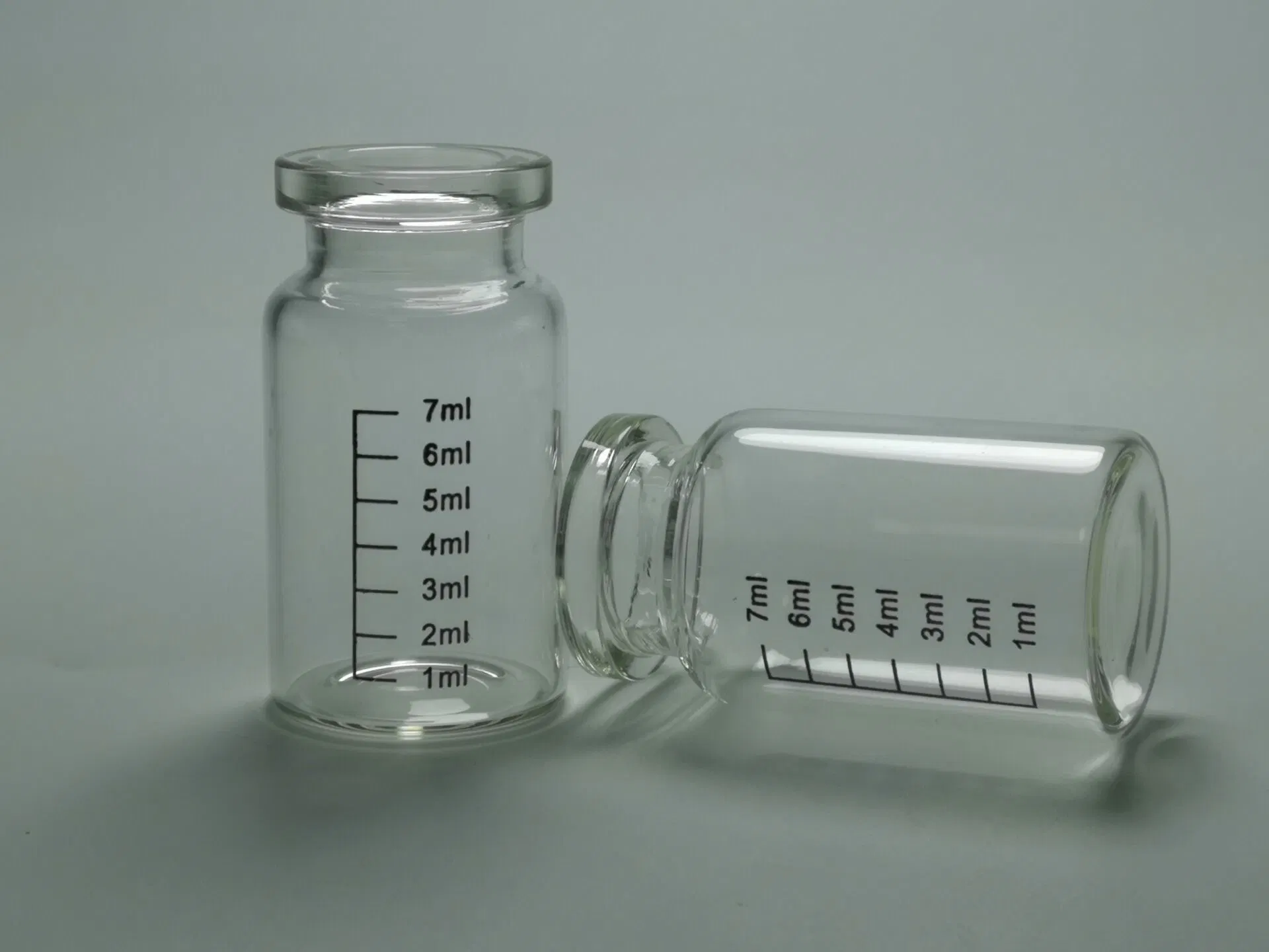 Viales de vidrio de borosilicato de GMP ISO Botella con todo tipo de tapa y la impresión personalizada