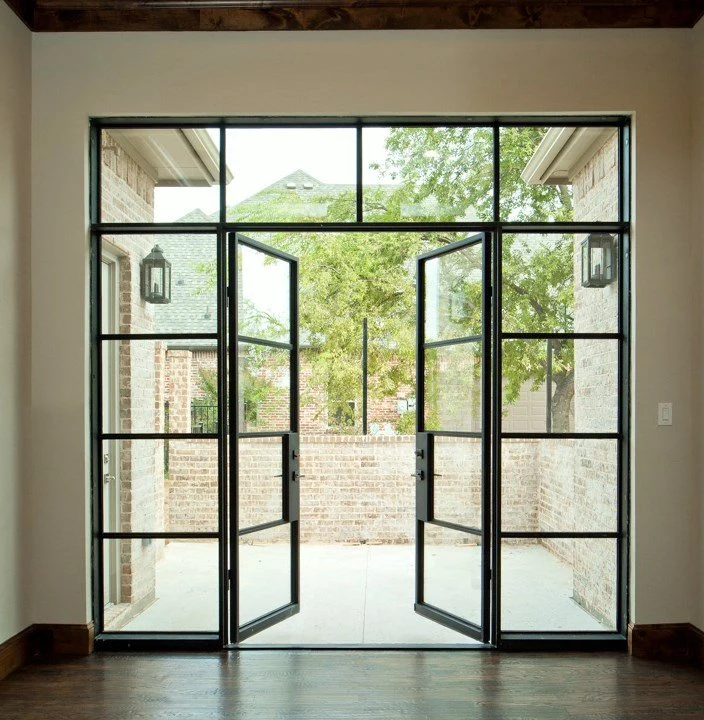 La entrada de la puerta de acero utiliza modernas puertas corredizas de vidrio Venta