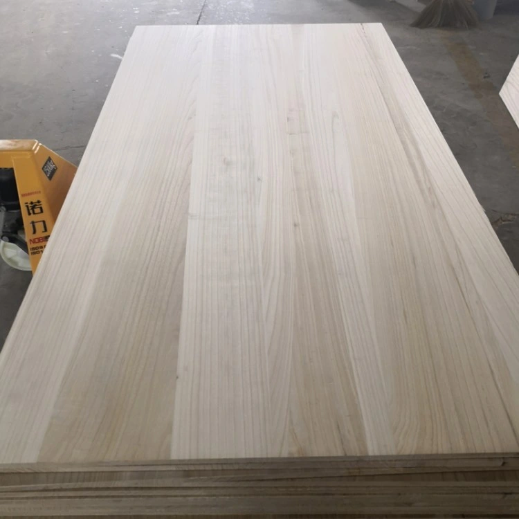 Madera sólida resistente al agua Paulownia Poplar Pine Panel de partículas cara de melamina Partícula Finger Joint Laminated Edge Panel de Madera Tablón de Madera