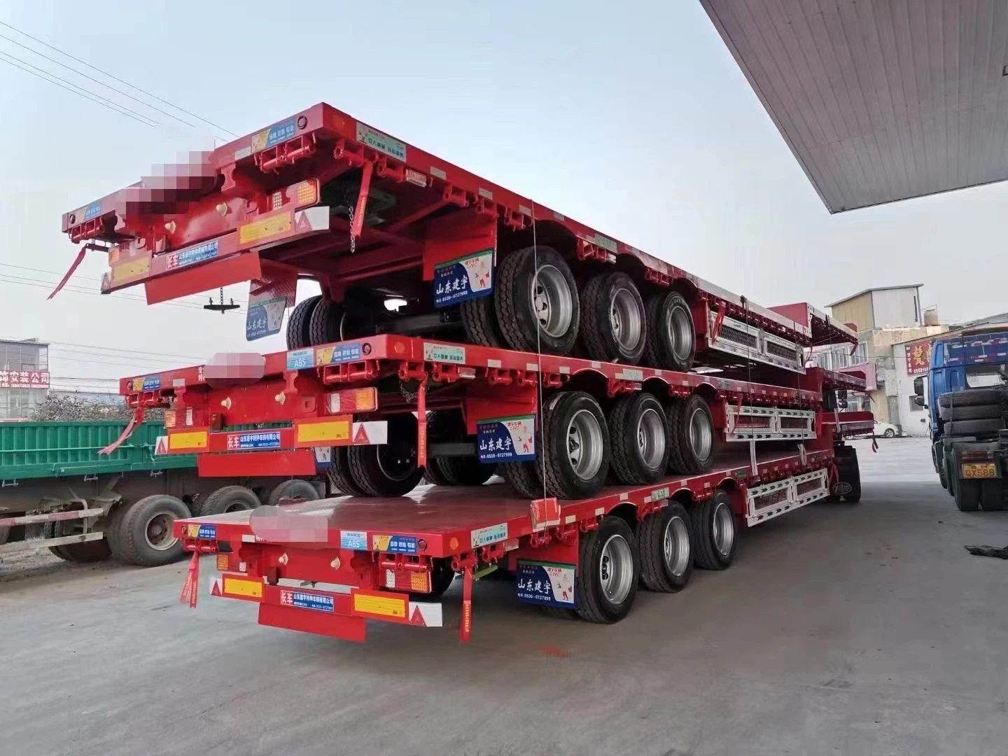 60 Tons 40 Foot Good Quality Container Chassis Flatbed Semi Trucks Trailer