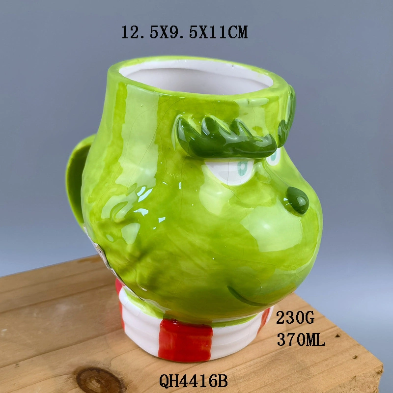 Navidad creativa la taza de café esculpida con cara de Santa de Grinch