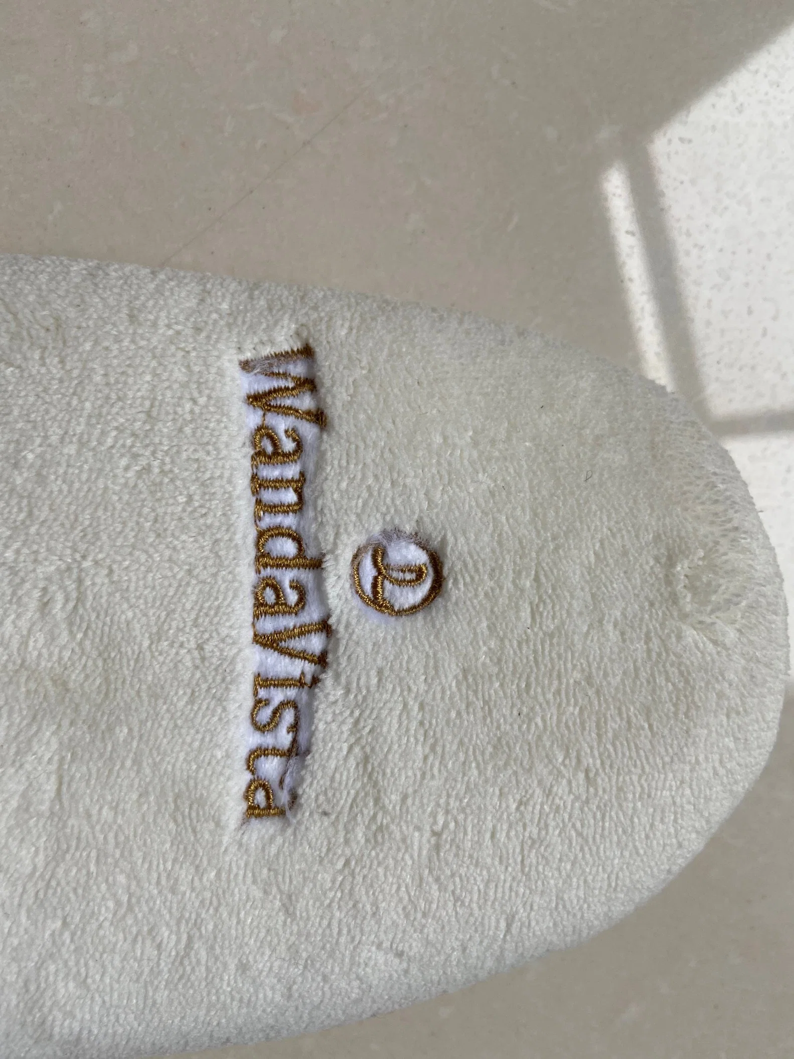 Hotel Logotipo personalizado sábanas de algodón terciopelo Hotel zapatilla suministros líder