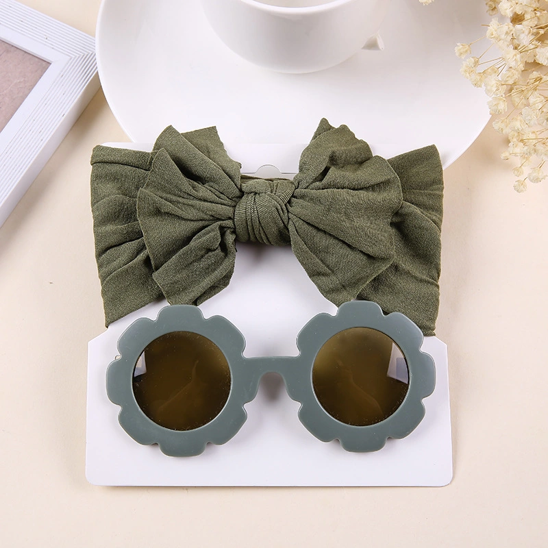 O bebé Toddler Headdress Girl Bow Sweat-Absorbing ajustável e o conjunto de óculos