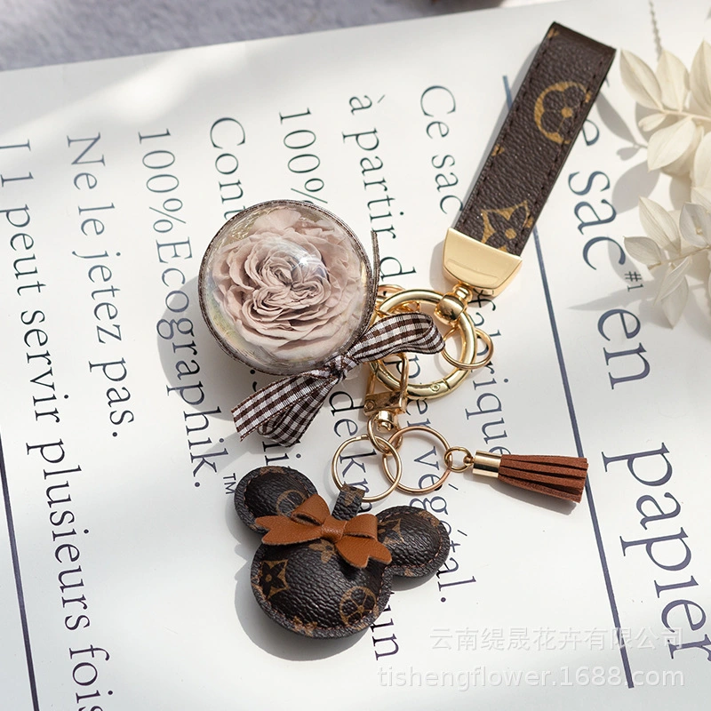 High-Quality Keychain with Preserved Fresh Flower (no water needed) , Best Gift and Souvenir Key Chain Made in China.