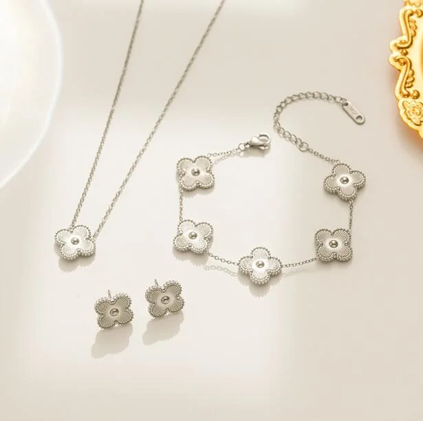 Fashion 4PCS/Set Four-Leaf Flower Silver Clavicle Chain Set Women New Trendy Design Laser Necklace Ring Bracelet Earring Jewelry Set