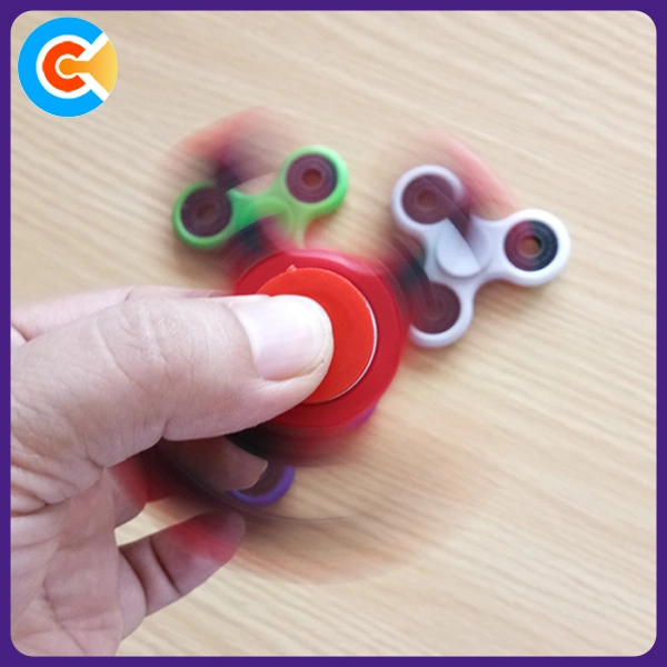 La mano de plástico Fidget Spinner juguetes para la diversión