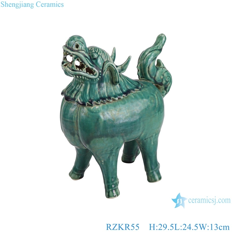 Légende chinoise Kylin Statues de sculpture en céramique d'animal licorne émaillée vert foncé.