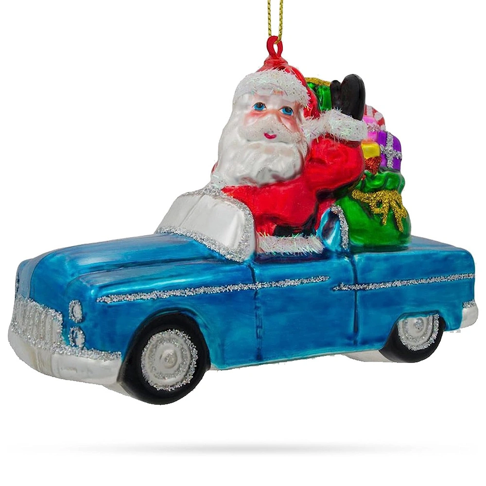 Santa dans une voiture décapotable de l'artisanat de verre plein de cadeaux de Noël en verre de l'ornement