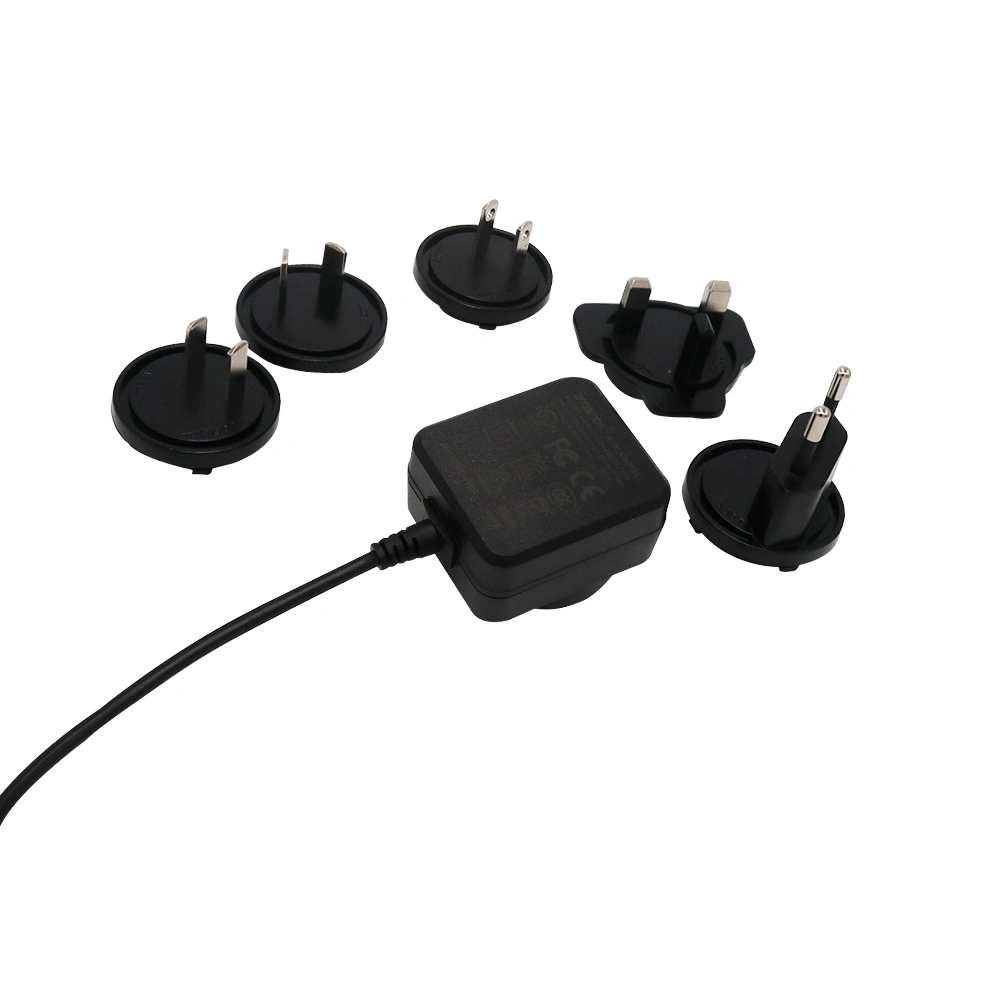 Múltiples Universal Us/Au/UK/Kr/enchufe europeo 5V 1A Fuente de alimentación ac a dc intercambiables de 5W Adaptador de cargador de pared