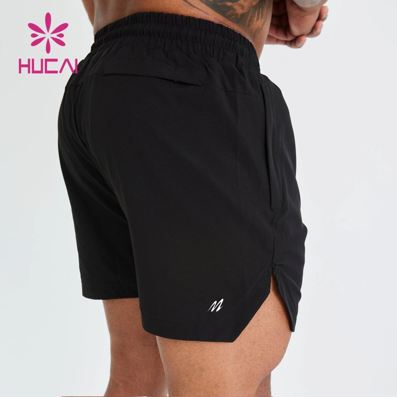 ODM Étiquette privée Sports Vente chaude Shorts de gym pour hommes avec poche pour téléphone, séchage rapide, respirant, impression d'écran.