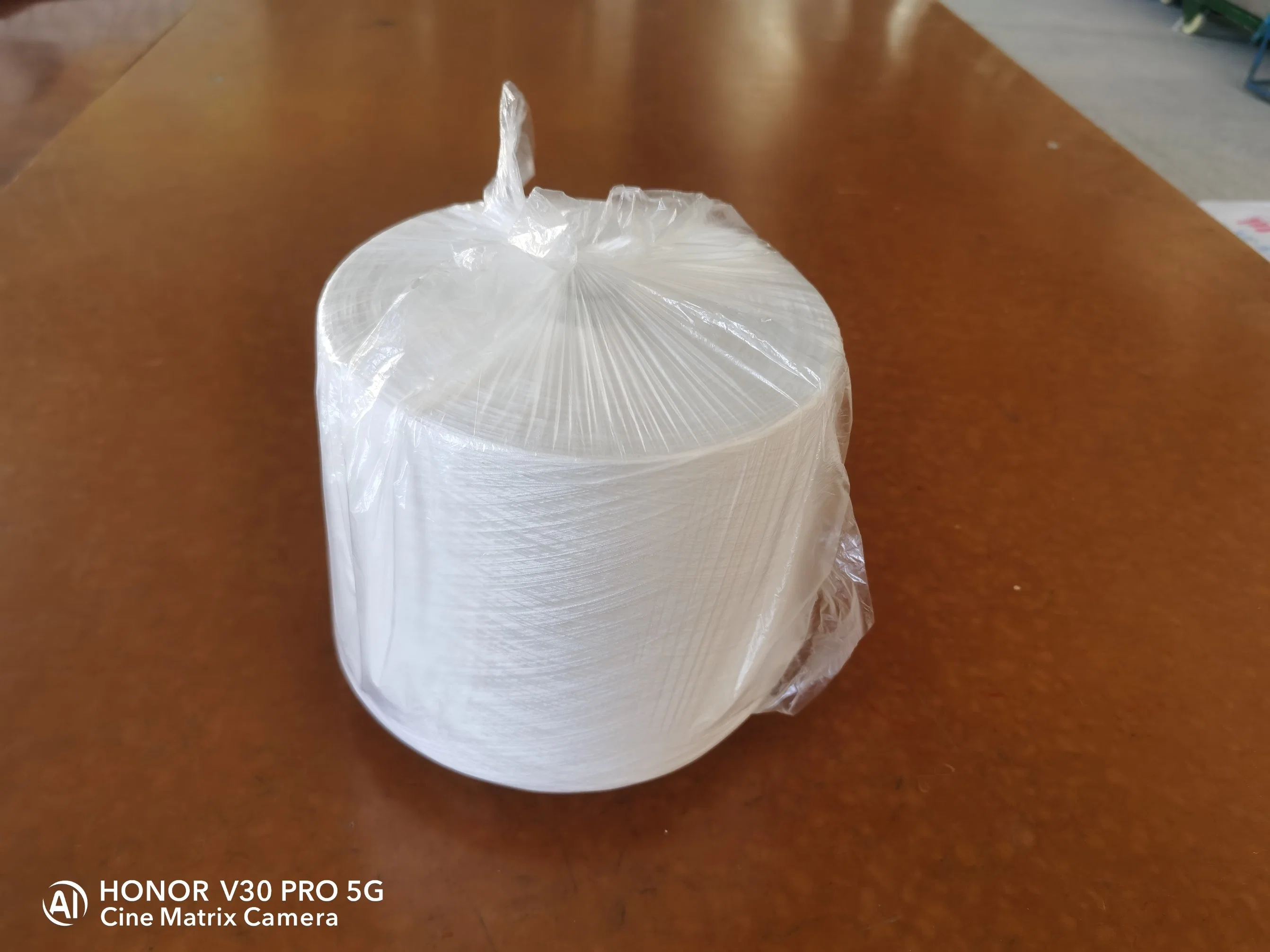 100% Yizheng210 Polyester Spun Yarn Count 60s/3 Tex 27 for Wovens Sportswear General Fabrics