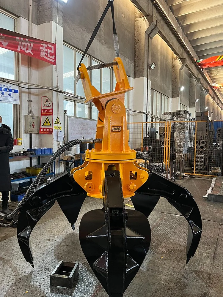 Grappin hydraulique rotatif à griffes orange personnalisé pour chargeuses sur pneus