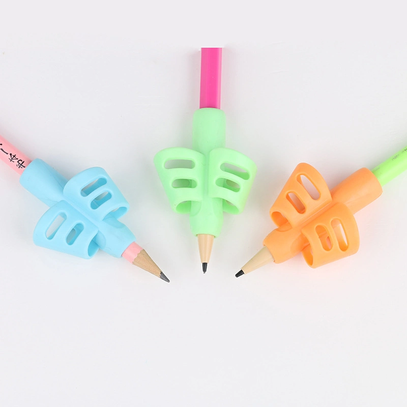 Wholesale/Supplier Stationery TPR Handwriting Aid Writing Grip Pencil Holder Pen Grip Pencil Grips