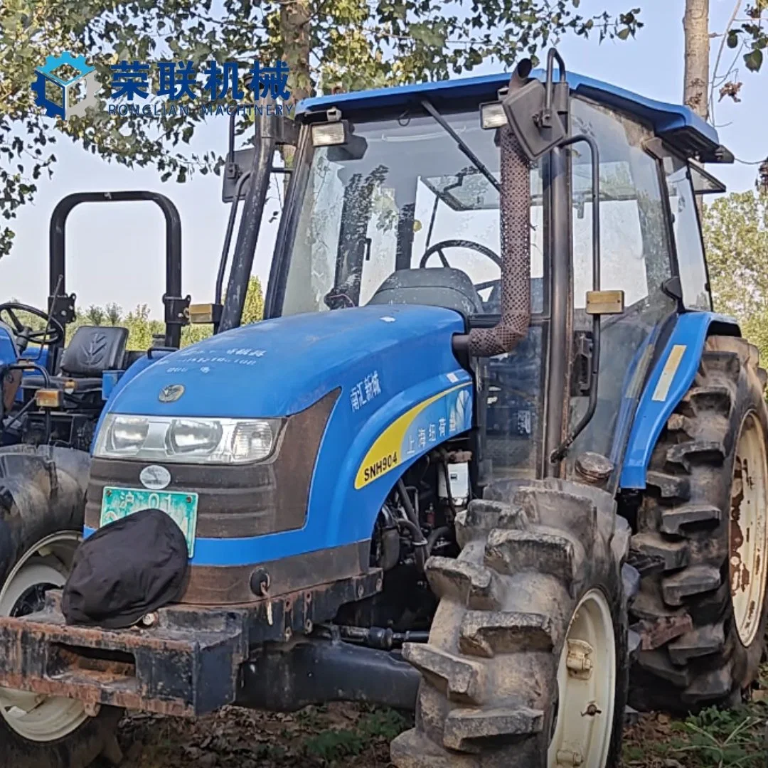 Tracteur compact 4RM d'occasion pour le transport de machines agricoles New Holland Snh904
