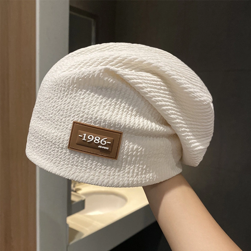 High Qualtiy Thin Breathable Leisure Knitted Loose Beanie Hat with Custom PVC Label