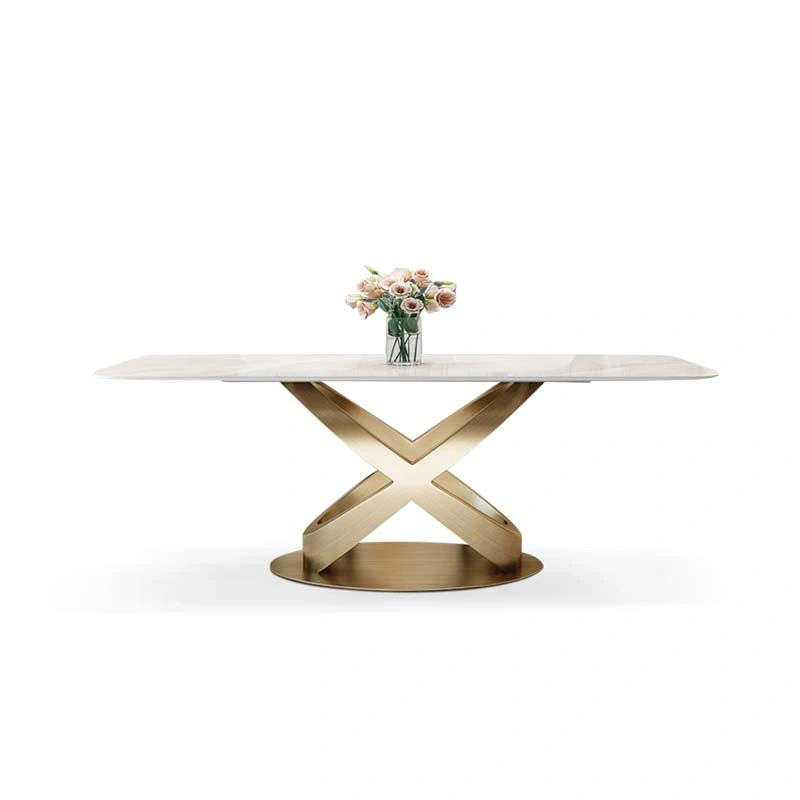 Mesa de comedor de mármol dorado de lujo moderno con silla y base de acero inoxidable.