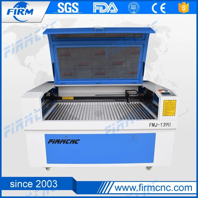 Jinan Venta 1300*900mm precio de fábrica cortadora y grabadora láser de CO2