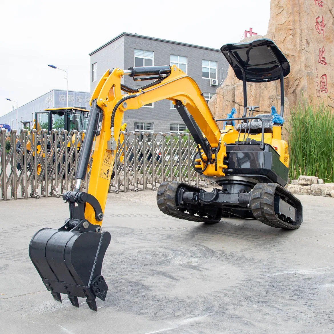 La construcción emplea Mini Excavadora de la máquina con motor de famosos