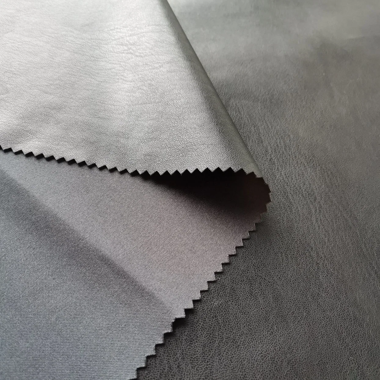 Cheap Synthetic PU Leather with Stretch Backing for Trousers