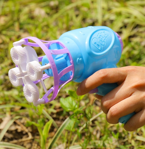 Pistola de plástico rosa personalizada de juguete eléctrico de burbujas