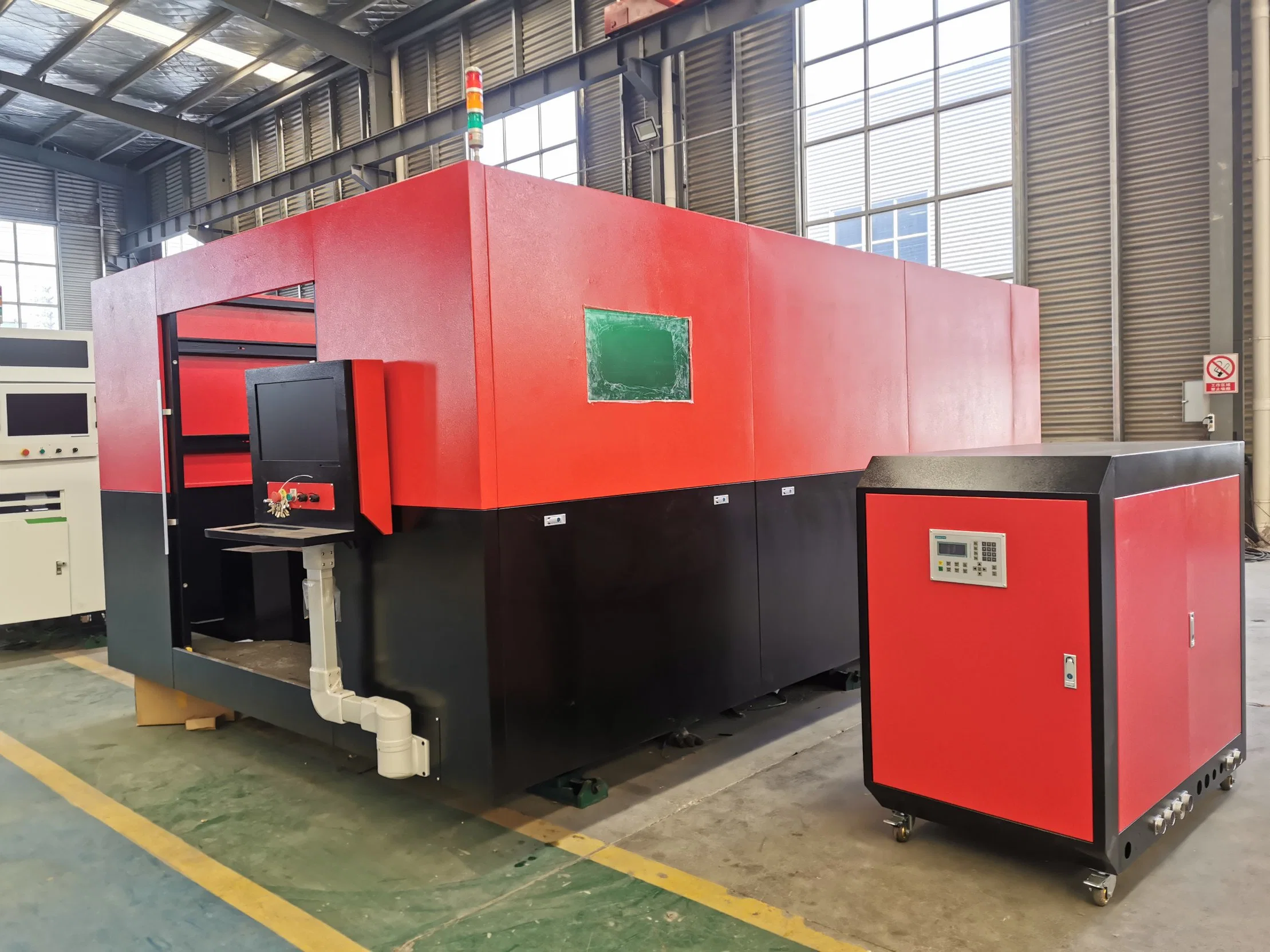 3015 4020 Fiber Laser Metal Cutting Machine Price 2000W 3000W Laser Power Source with Exchange Work Table to Cut Metal Steel/Aluminum/Copper/Brass