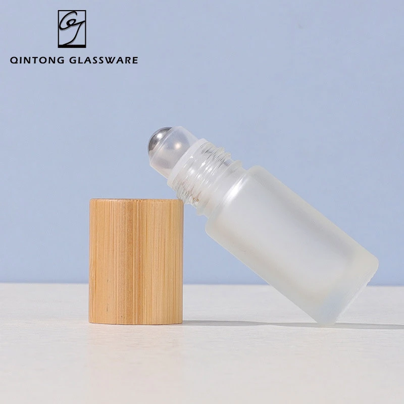 Factory Price 5ml 10ml 15ml Environmentally Friendly Matte Glass Cosmetics Packaging Perfume Glass Essential Oil Bottle with Bamboo Lid and Roller Ball